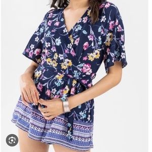 Francesca’s Blue Rain romper, wrap front, low back, 2” short, lined, waist belt